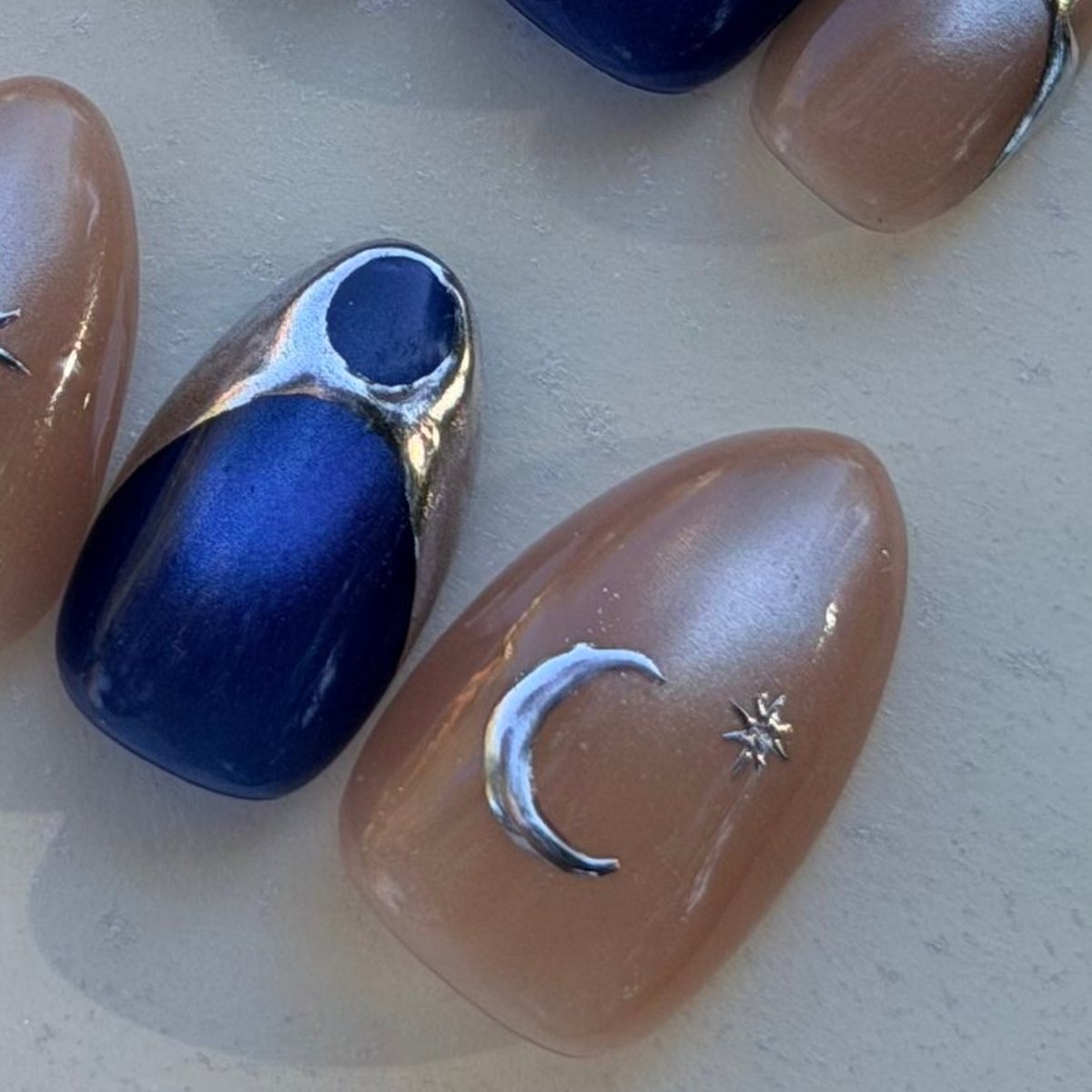 Midnight Sky press-on nails, close-up of the hand-painted detail